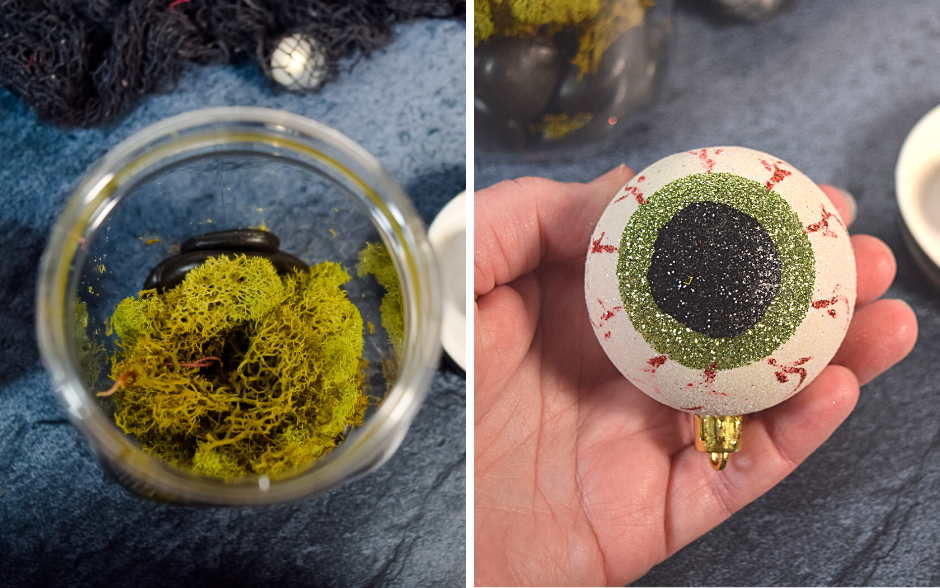 Collage with one image showing the inside of the mason jar with black rocks and green moss on top of it.  The second image shows an eyeball ornament in a hand. 