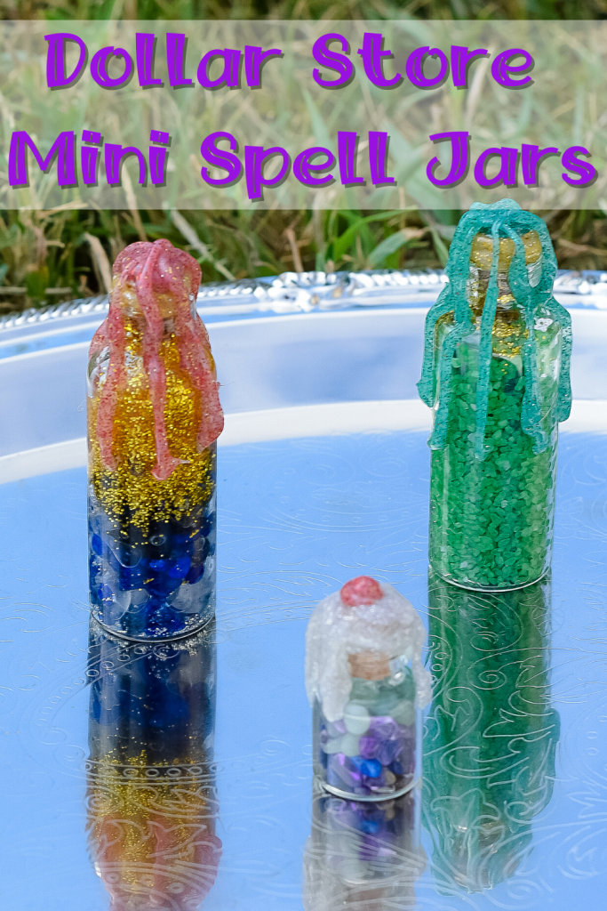 Title image with finished dollar store mini spells jars on a silver platter. 